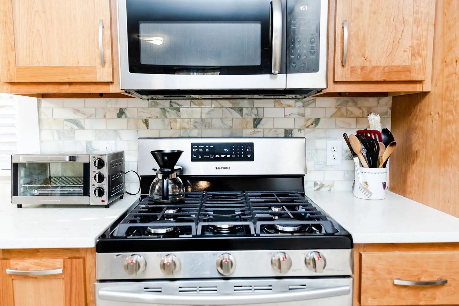 Perspective showing coordinated materials and finishes from Kitchen Remodel — Kingsmill Williamsburg Virginia by VanFleet Homes